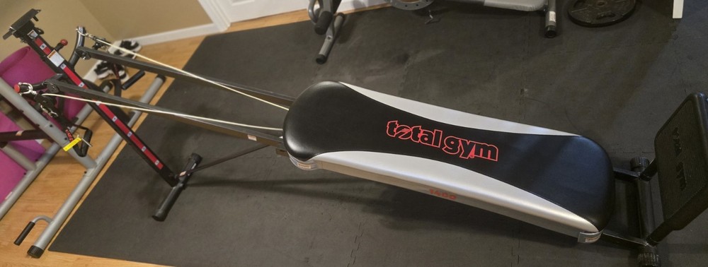 Total Gym 1400. Strengthens and tones major muscle groups. Folds for storage