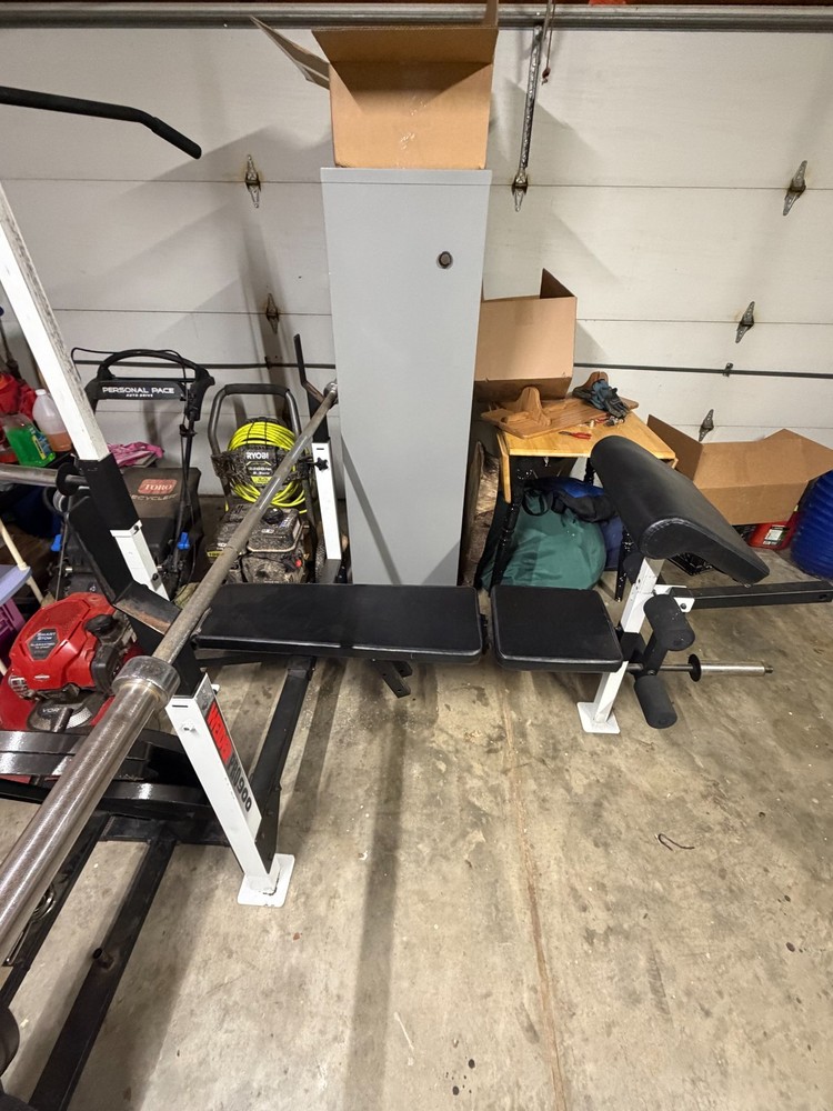 used bench press with leg press and lat pull down and free wights