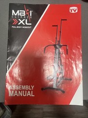Maxi Climber XL Full Body Workout With A Red Trim And Gray And Black Color.